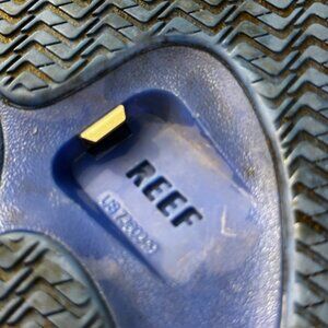 Reefs flip flops with bottle cap opener